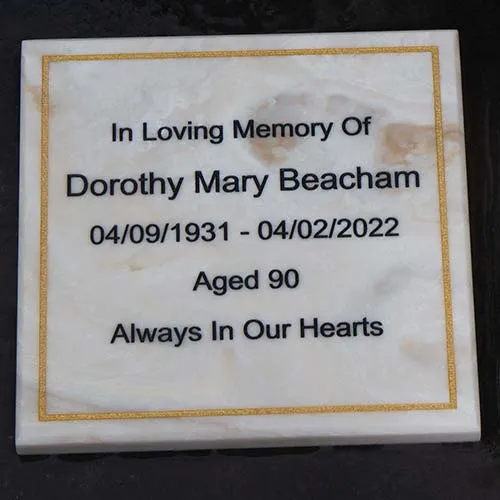 The marble corian looks very similar to actual marble. Engraved Marble Corian Memorial Plaque