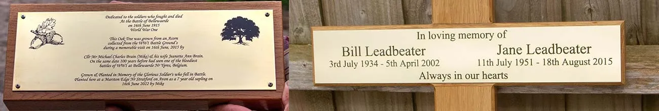 Engraved plaques on backing board and cros