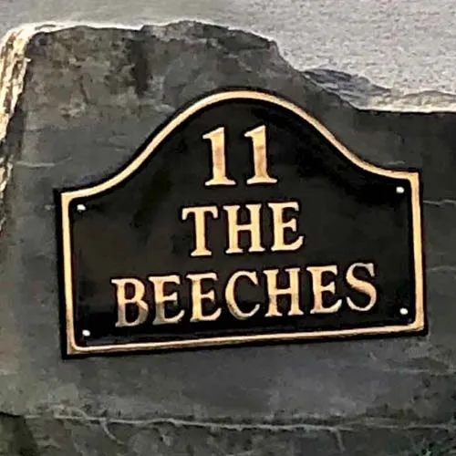 This brass name plate looks great attached to a boulder. Cast Brass Name Plate