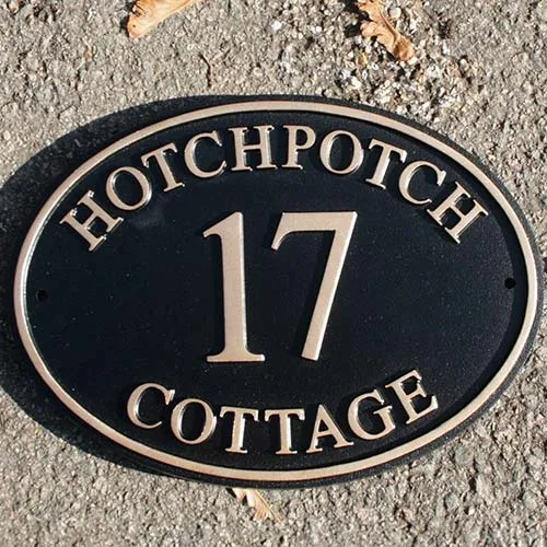This sign includes house name and number. Oval House Sign with Number