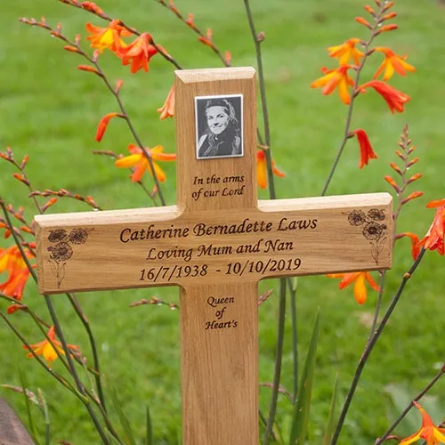 These memorial plaques do make the wooden cross more personal. Porcelain Memorial Plaque on Wooden Cross