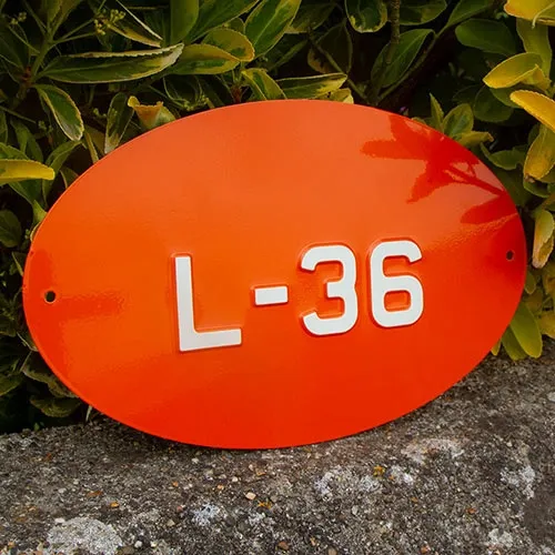 Very long lasting nameplates. Embossed Metal Number