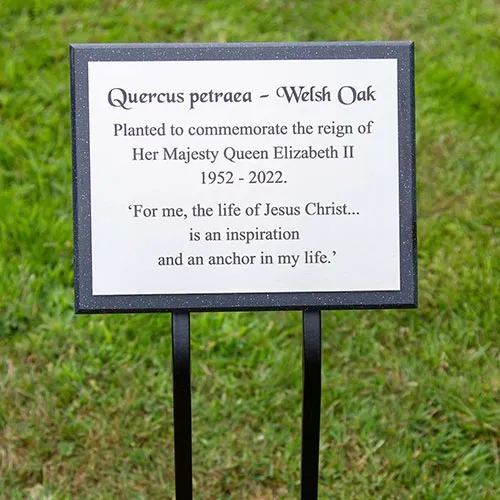 Engraved Plaque On Corian Backing Board.