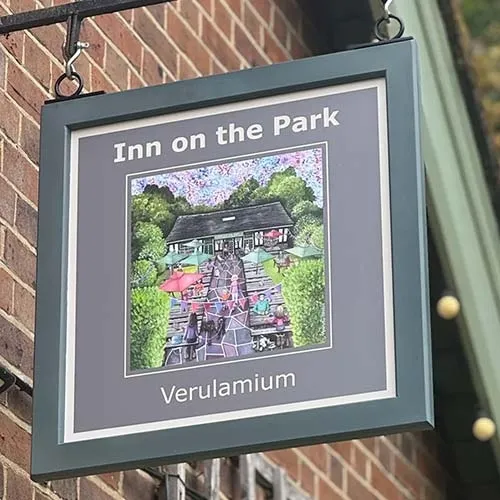 Framed sign with full colour printed panel. Painted Framed Hanging Sign