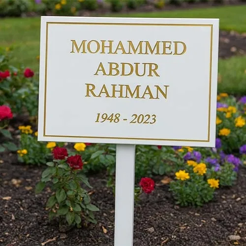 This was fitted to a white painted angle iron tree stake White Corian Plaque with Gold Text