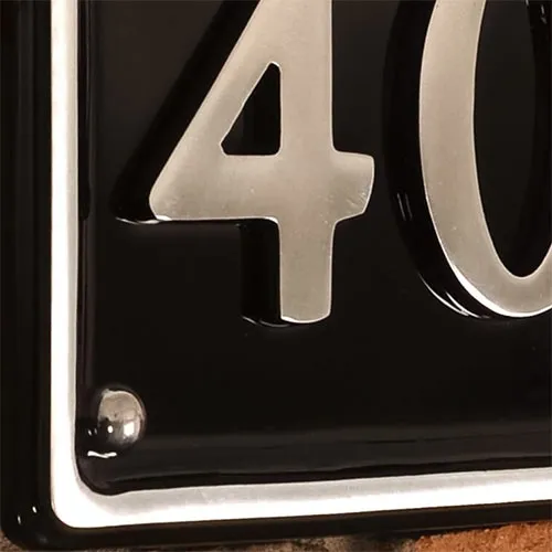 Close up of Polished Aluminium Door Number